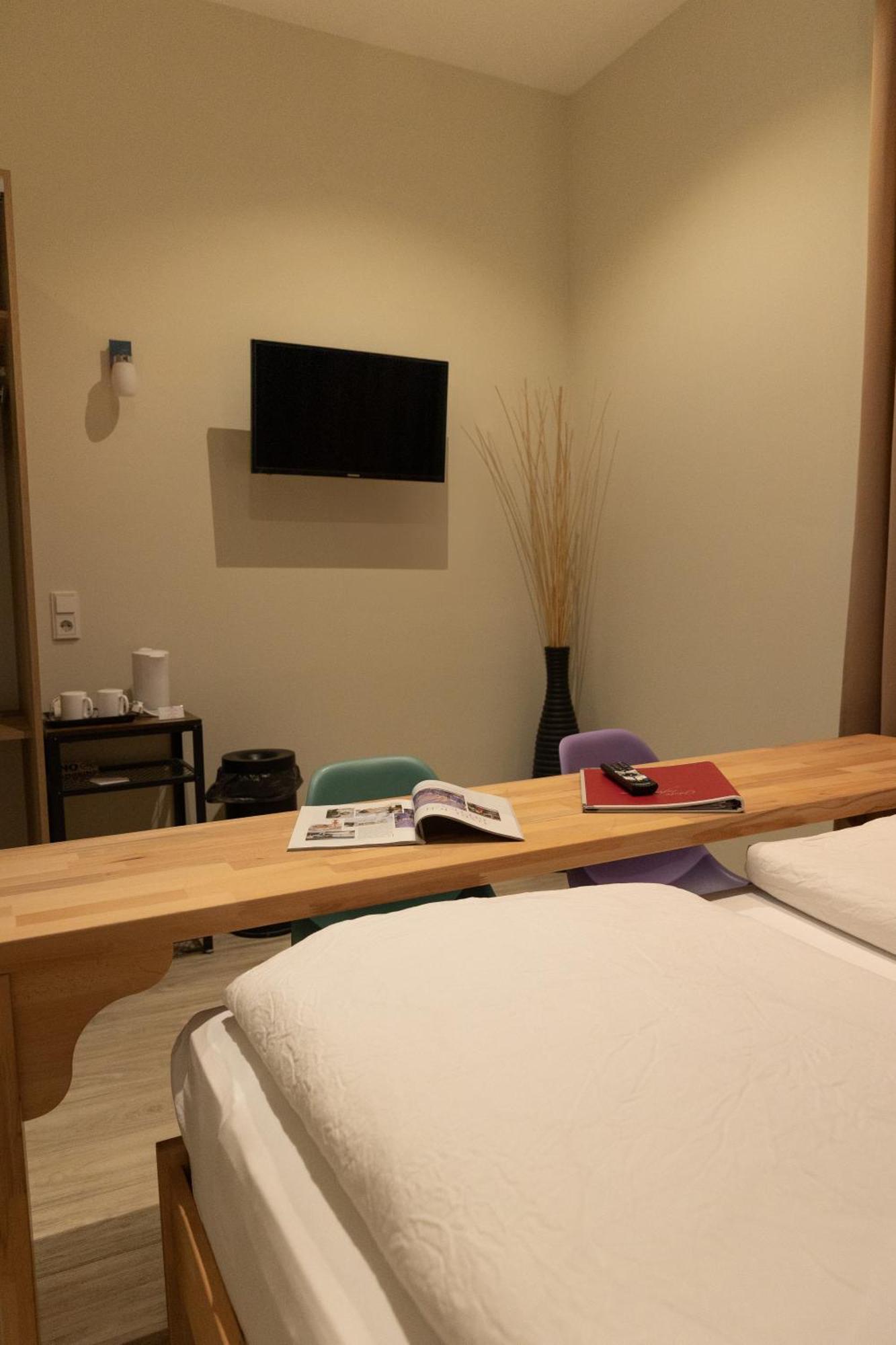 Small Double Room with Courtyard View,1565538415:JPEG